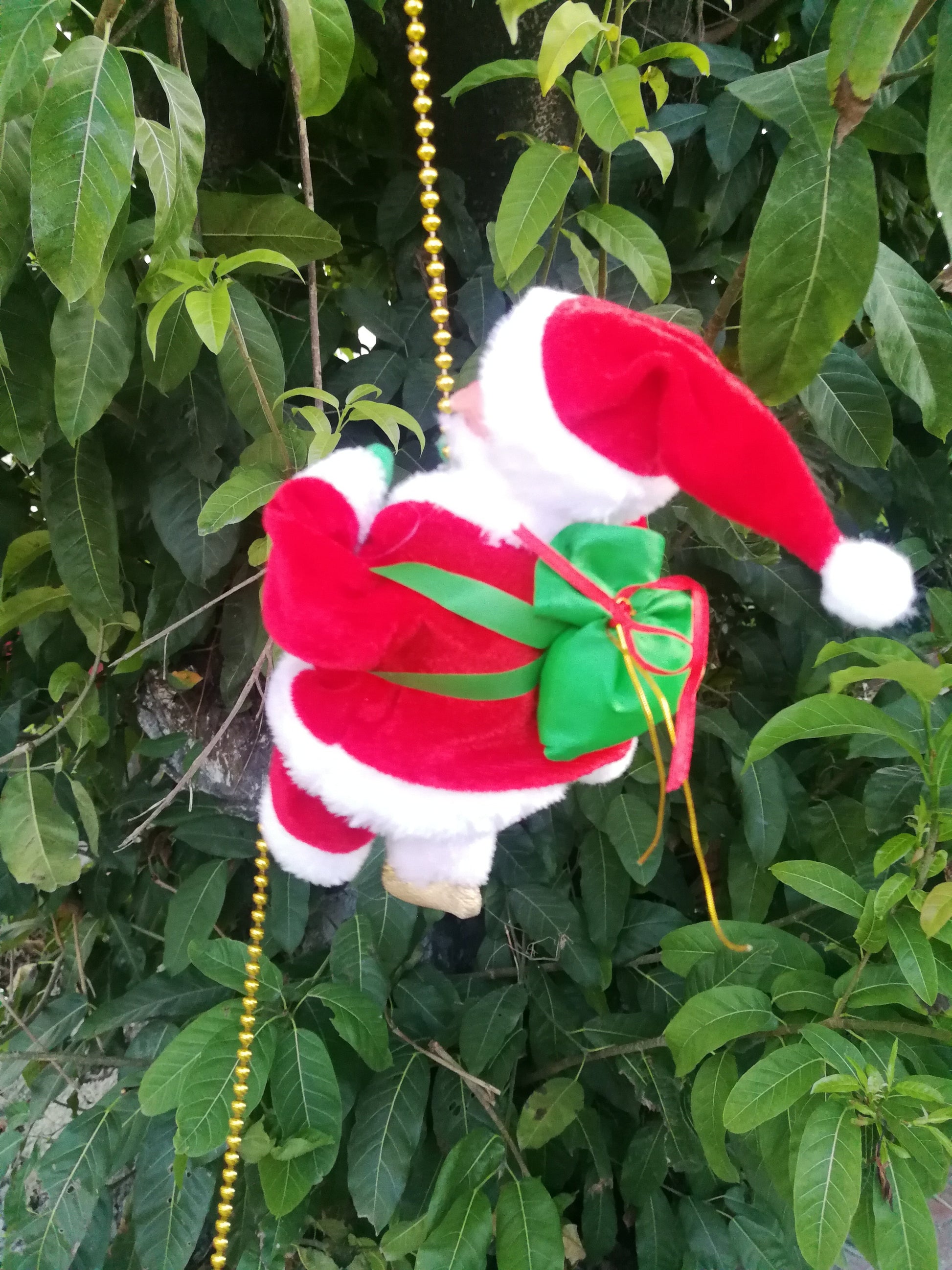 Musikalischer Kletternder Weihnachtsmann