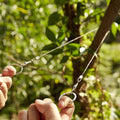 Stahldraht-Säge - Wood Cutter